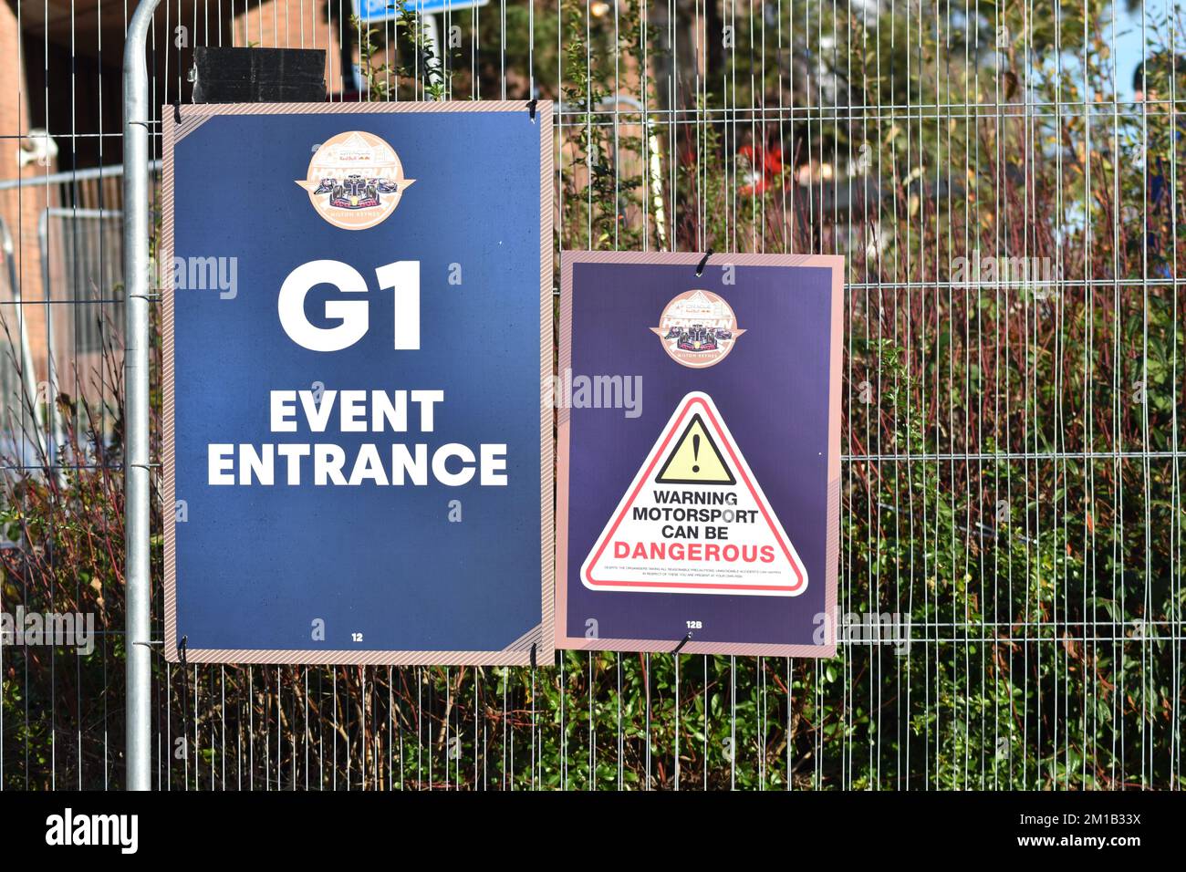 Signs at Redbull Racing's Homerun in Central Milton Keynes on 10 December 2022. 'Motorsport can be dangerous.' Stock Photo