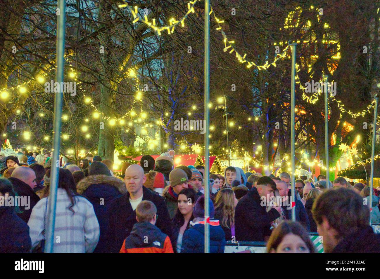Edinburgh, Scotland, UK 11h December, 2022.  Night time Christmas fairs in Edinburgh saw tourists and locals crowd the attractions. The fair at the base of the castle beside the fountain is a hidden gem Credit Gerard Ferry/Alamy Live News Stock Photo