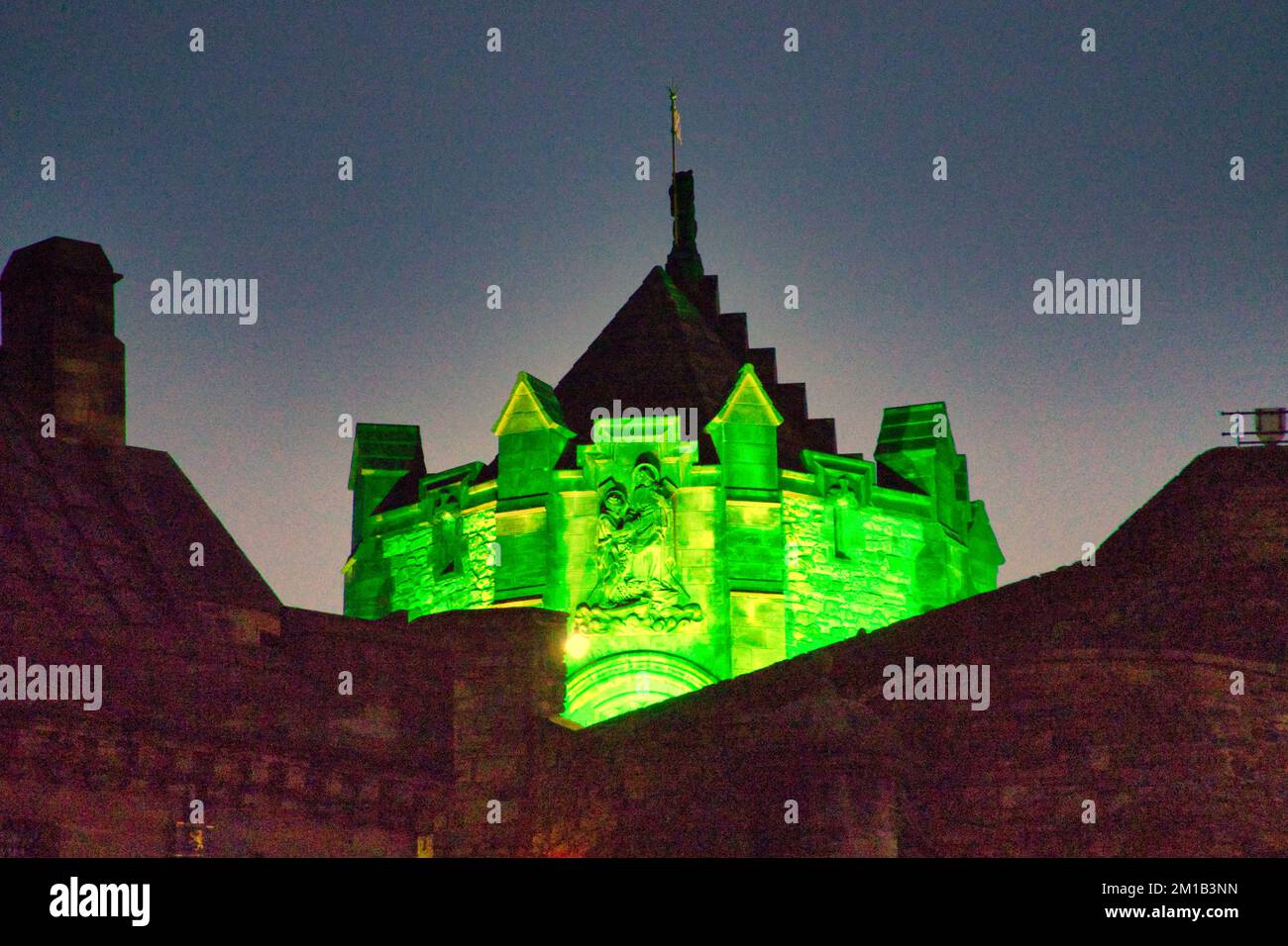 Edinburgh, Scotland, UK 11h December, 2022.  Night time Christmas fairs in Edinburgh saw tourists and locals crowd the attractions. The castle lit for christmas.Credit Gerard Ferry/Alamy Live News Stock Photo