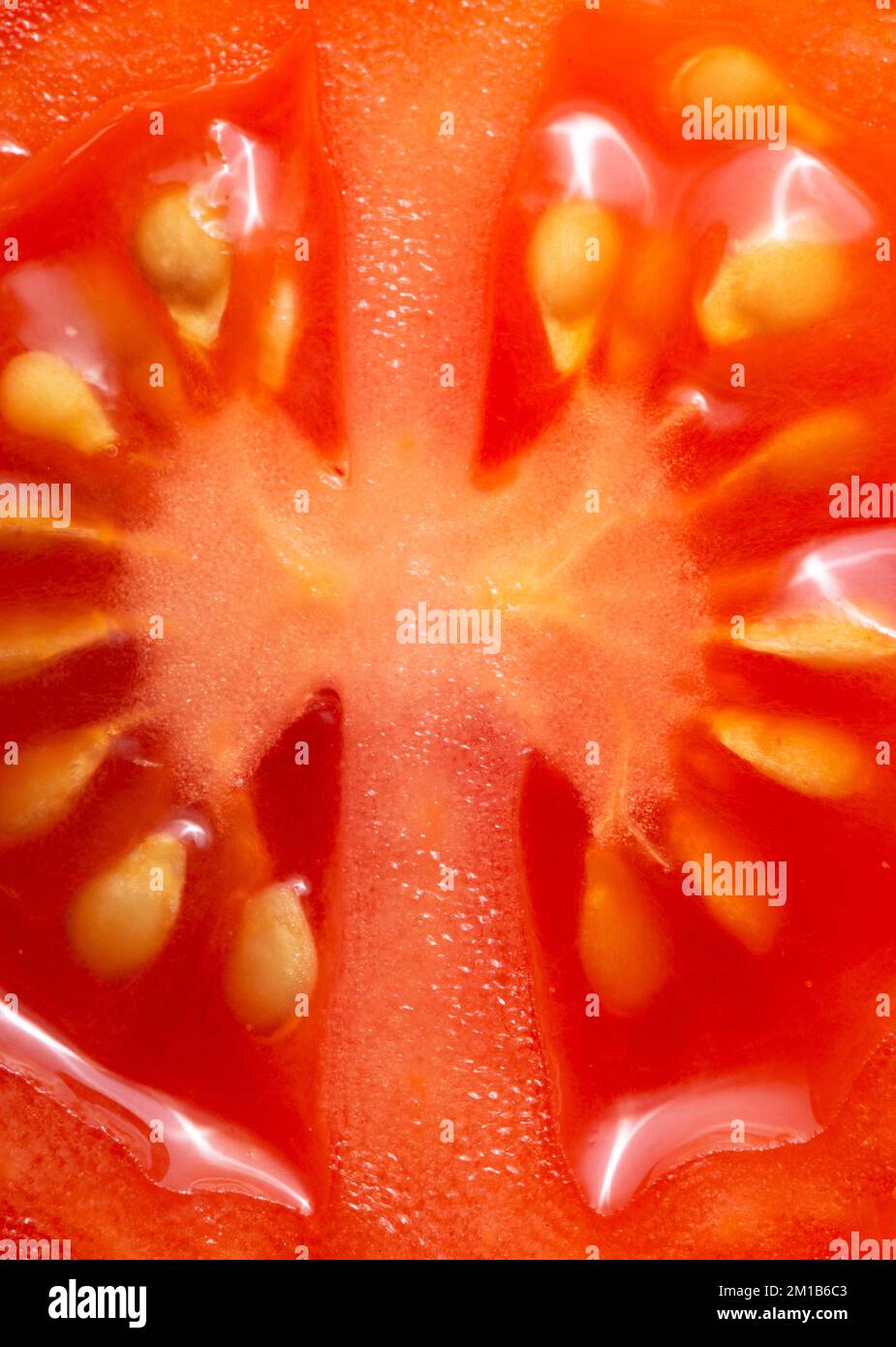 Tomato texture as a background. A close shot of a Tomato . Macro photo. Tomato . Close-up Stock Photo