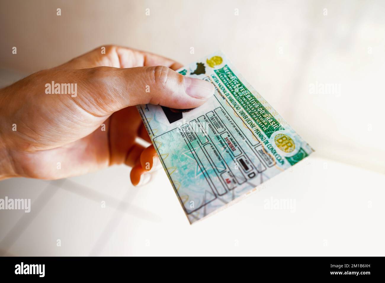 brazil-11th-dec-2022-in-this-photo-illustration-a-hand-holds-the