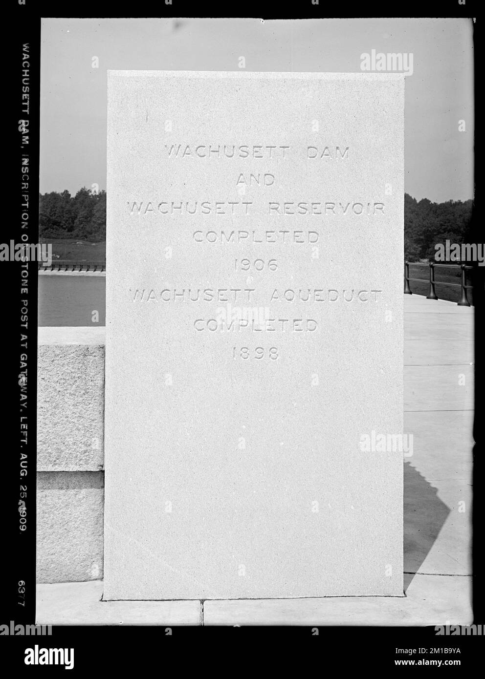 Wachusett Dam, inscription on stone post at gateway, left, Clinton, Mass., Aug. 25, 1909 , waterworks, dams, inscriptions Stock Photo
