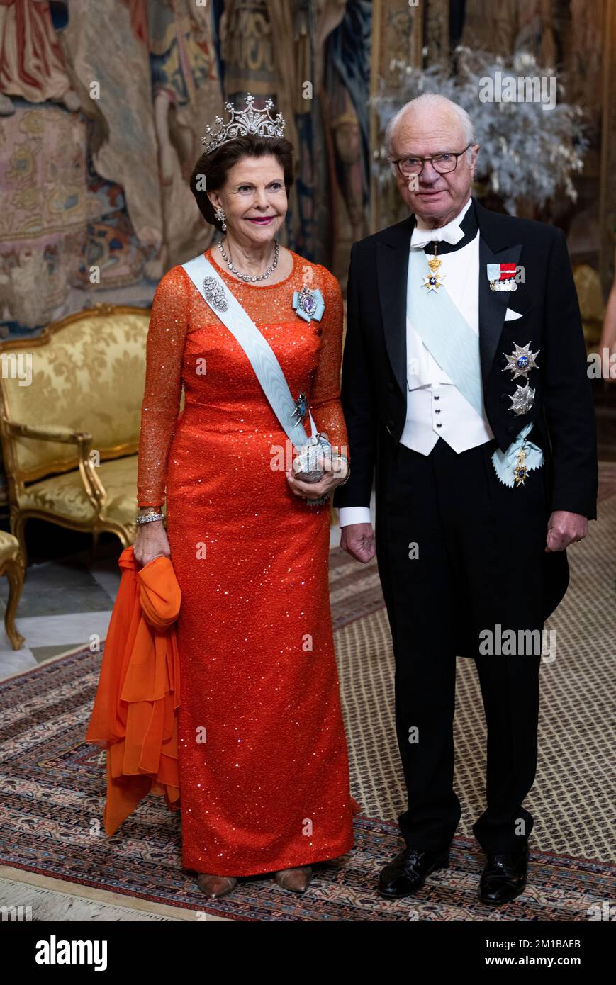 Queen Silvia and King Carl Gustaf attend the King's dinner for the Nobel laureates at the Royal Palace in Stockholm, Sweden, 11 December 2022.  Photo: Pontus Lundahl / TT / 10050 Stock Photo