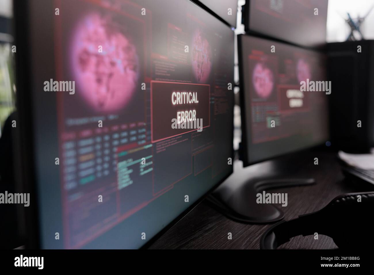 Multiple Monitors Showing Critical Error Message After Cyber Crime multiple-monitors-showing-critical-error-message-after-cyber-crime
