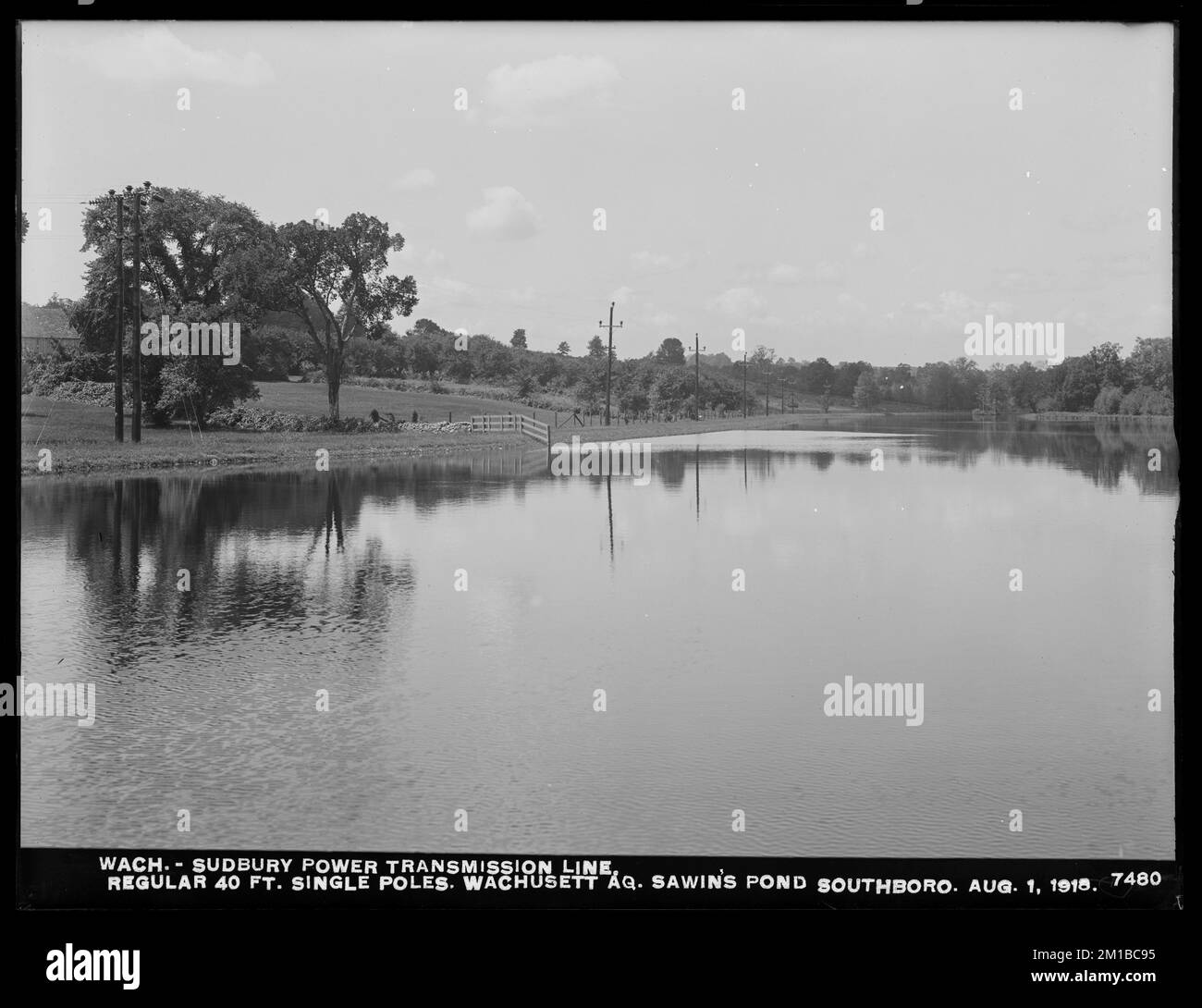 Wachusett Department, Wachusett-Sudbury power transmission line, regular 40-foot single poles, Wachusett Aqueduct, Sawin's Pond, Southborough, Mass., Aug. 1, 1918 , waterworks, power lines, construction completed Stock Photo