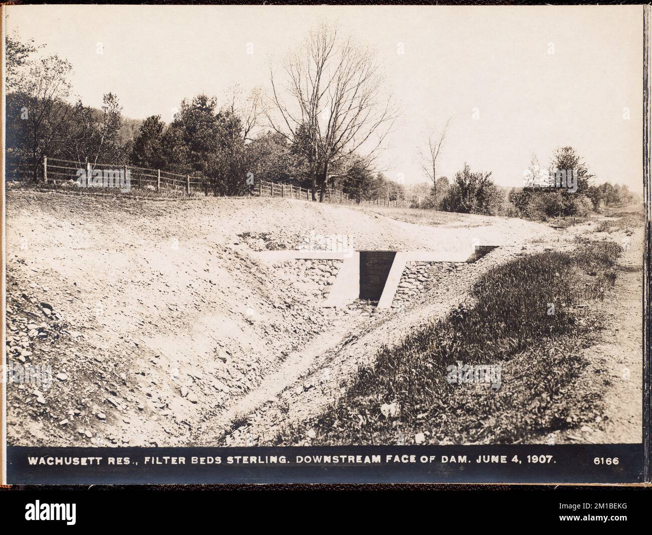 Wachusett Reservoir, downstream face of dam at filterbeds, Sterling, Mass., Jun. 4, 1907