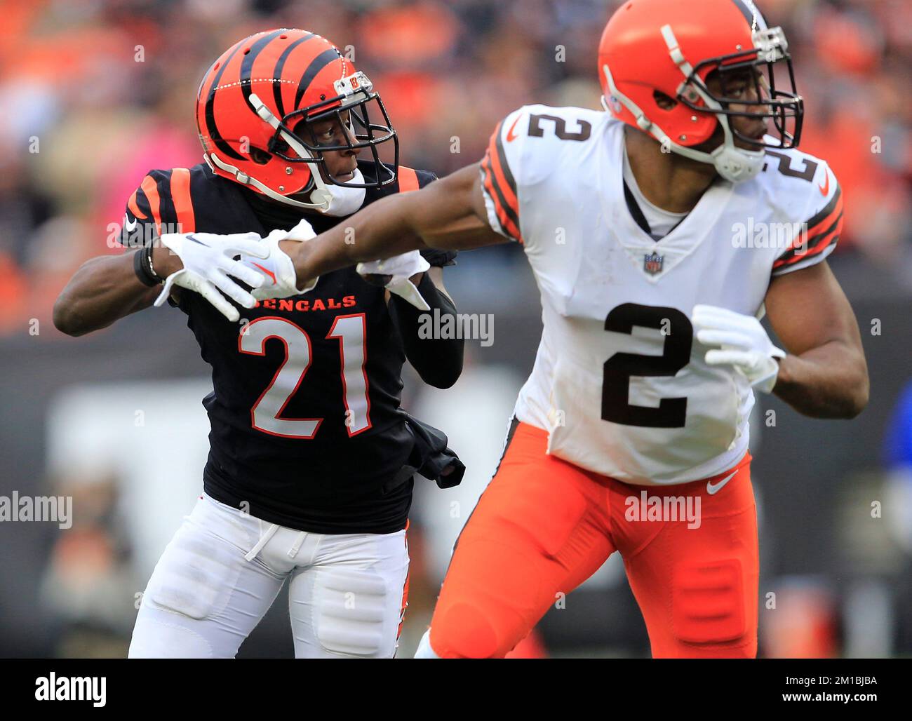 Cincinnati Bengals free safety Jessie Bates (30) and Mike Hilton celebrate  after breaking up a pass during the first half of an NFL football game  against the Kansas City Chiefs, Sunday, Jan.