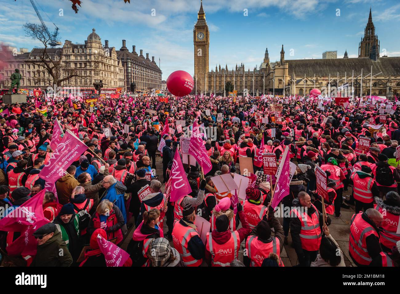 Thousands of striking Royal Mail workers rally in Parliament Square in London. Stock Photo