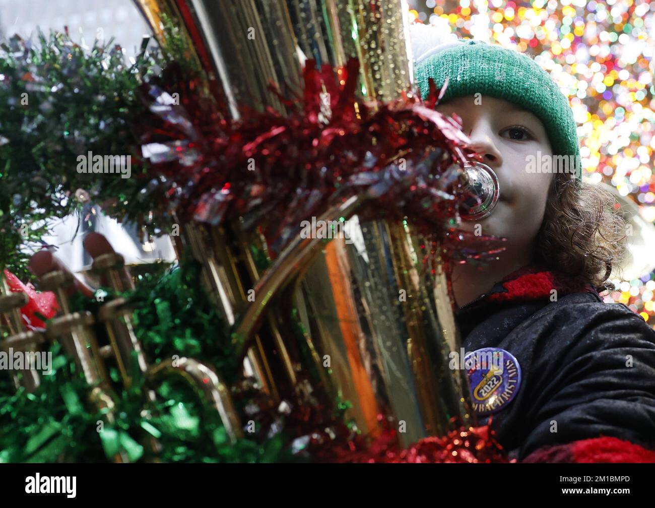 New York, United States. 11th Dec, 2022. Tuba players assemble and perform holiday songs under