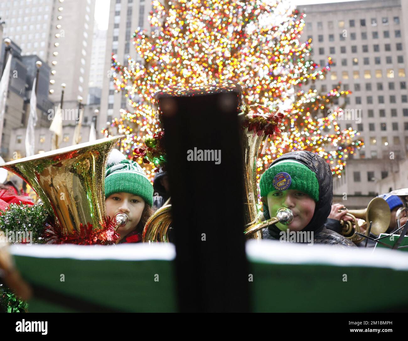 New York, United States. 11th Dec, 2022. Tuba players assemble and perform holiday songs under