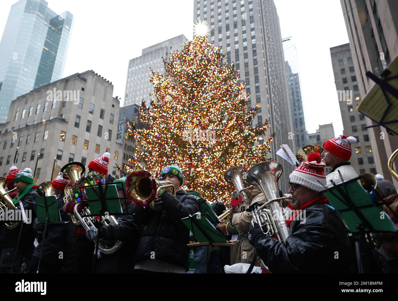 New York, United States. 11th Dec, 2022. Tuba players assemble and perform holiday songs under