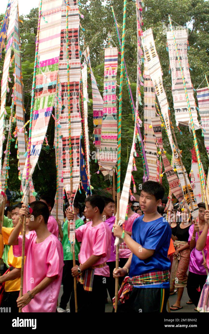 Many pretty woman on traditional dance in Tak Bat Dok Mai Festival is Ceremony of Wat Phra Buddhabat Woramahaviharn temple in Saraburi , Thailand. Stock Photo