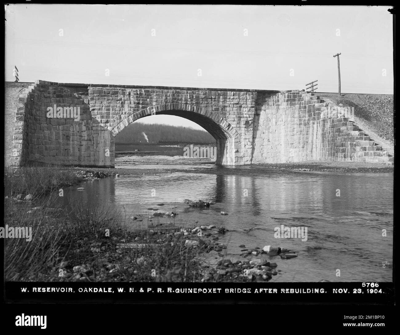 Wachusett Reservoir, Worcester, Nashua & Portland Railroad bridge over Quinapoxet River after rebuilding, Oakdale, West Boylston, Mass., Nov. 23, 1904 , waterworks, railroad bridges, arch bridges Stock Photo