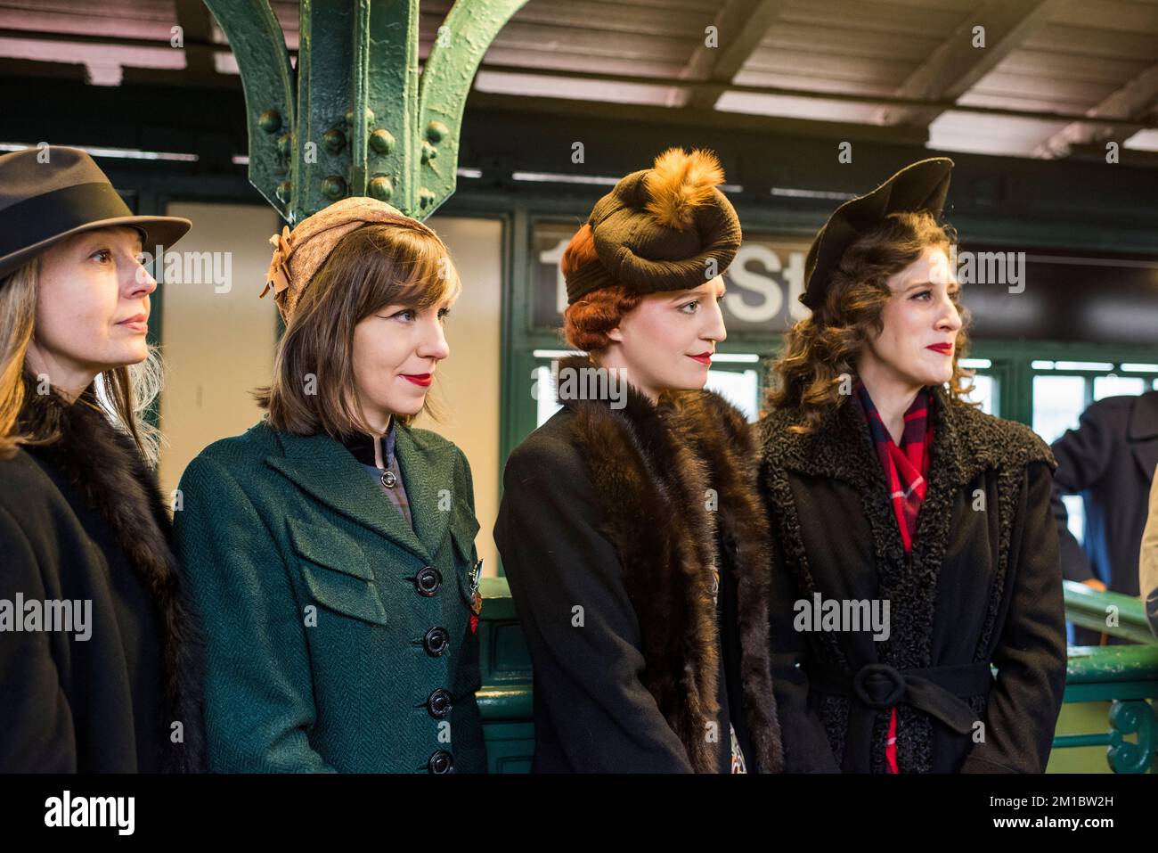 New York City, New York - December 11, 2022: People in period clothing waiting for the Train of Many Colors, Holiday Nostalgia Rides, NYC Subway Stock Photo