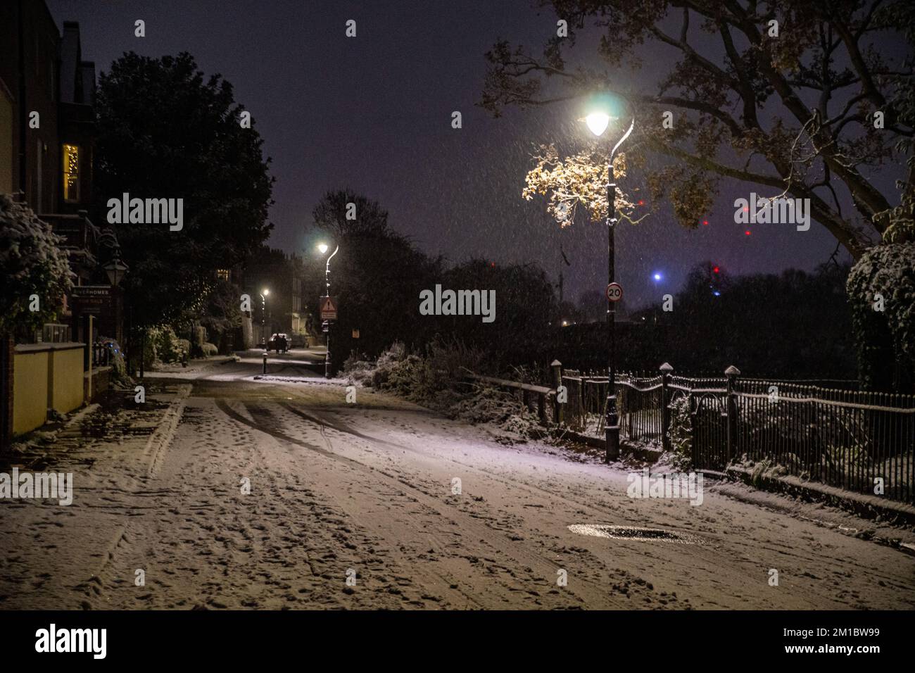 London, UK. 11th Dec, 2022. Snow Envelops Chiswick Mall and the High