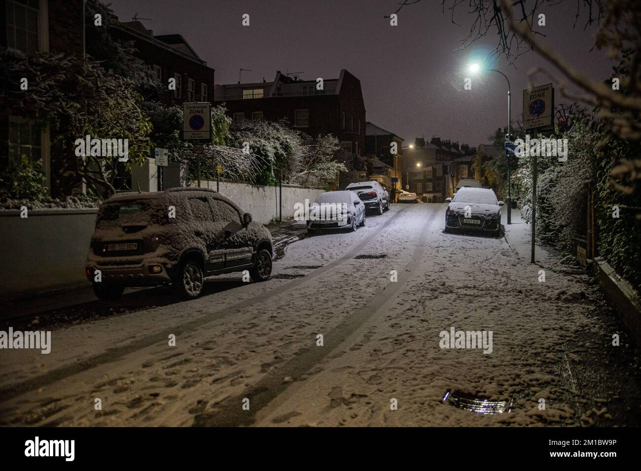 London, UK. 11th Dec, 2022. Snow Envelops Chiswick Mall and the High