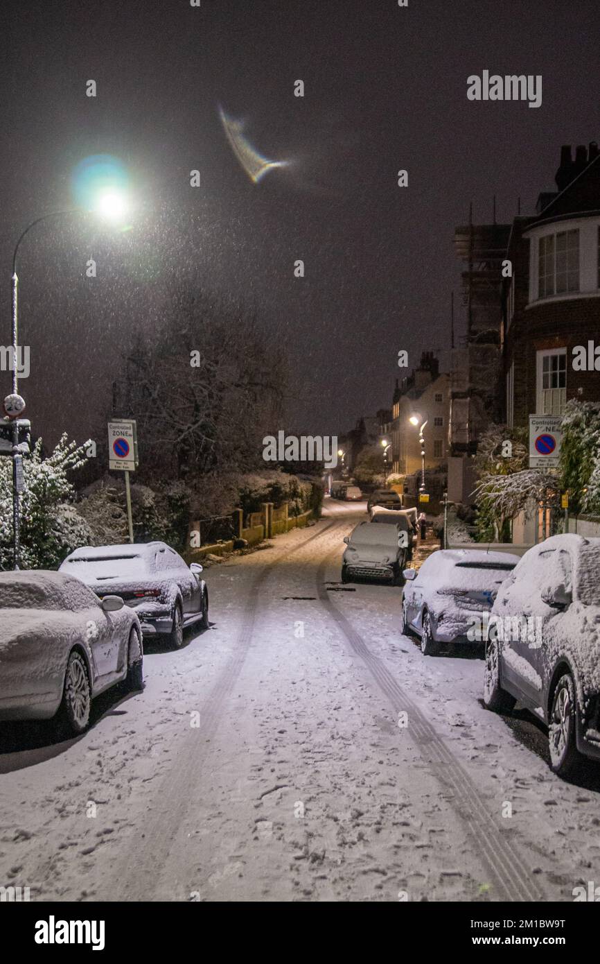 London, UK. 11th Dec, 2022. Snow Envelops Chiswick Mall and the High