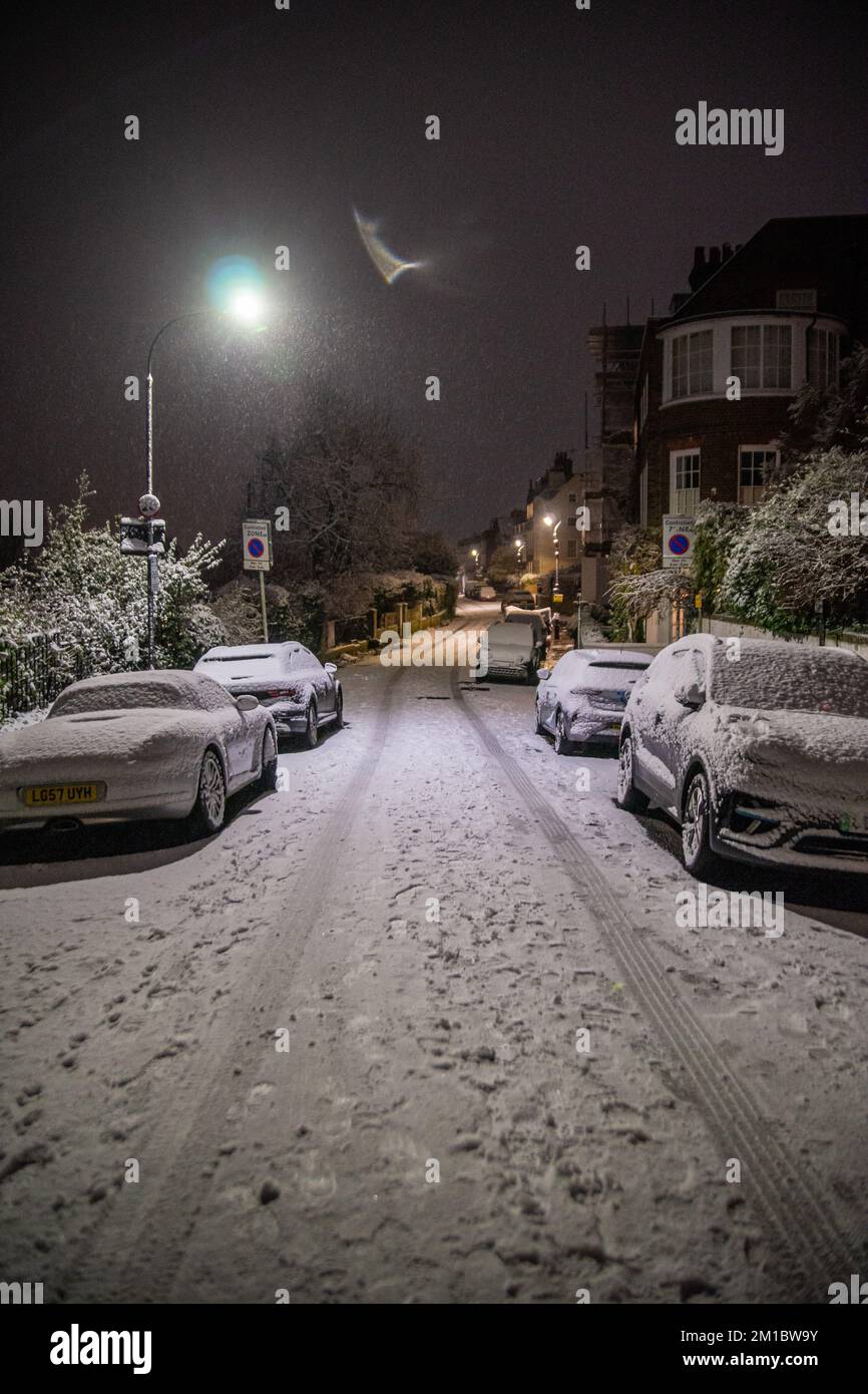 London, UK. 11th Dec, 2022. Snow Envelops Chiswick Mall and the High