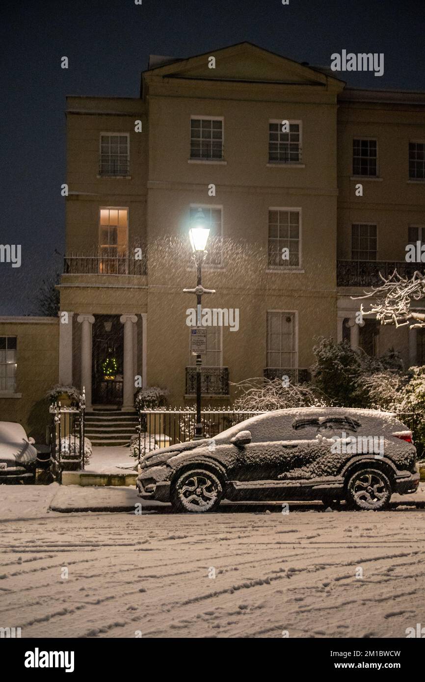London, UK. 11th Dec, 2022. Snow Envelops Chiswick Mall and the High