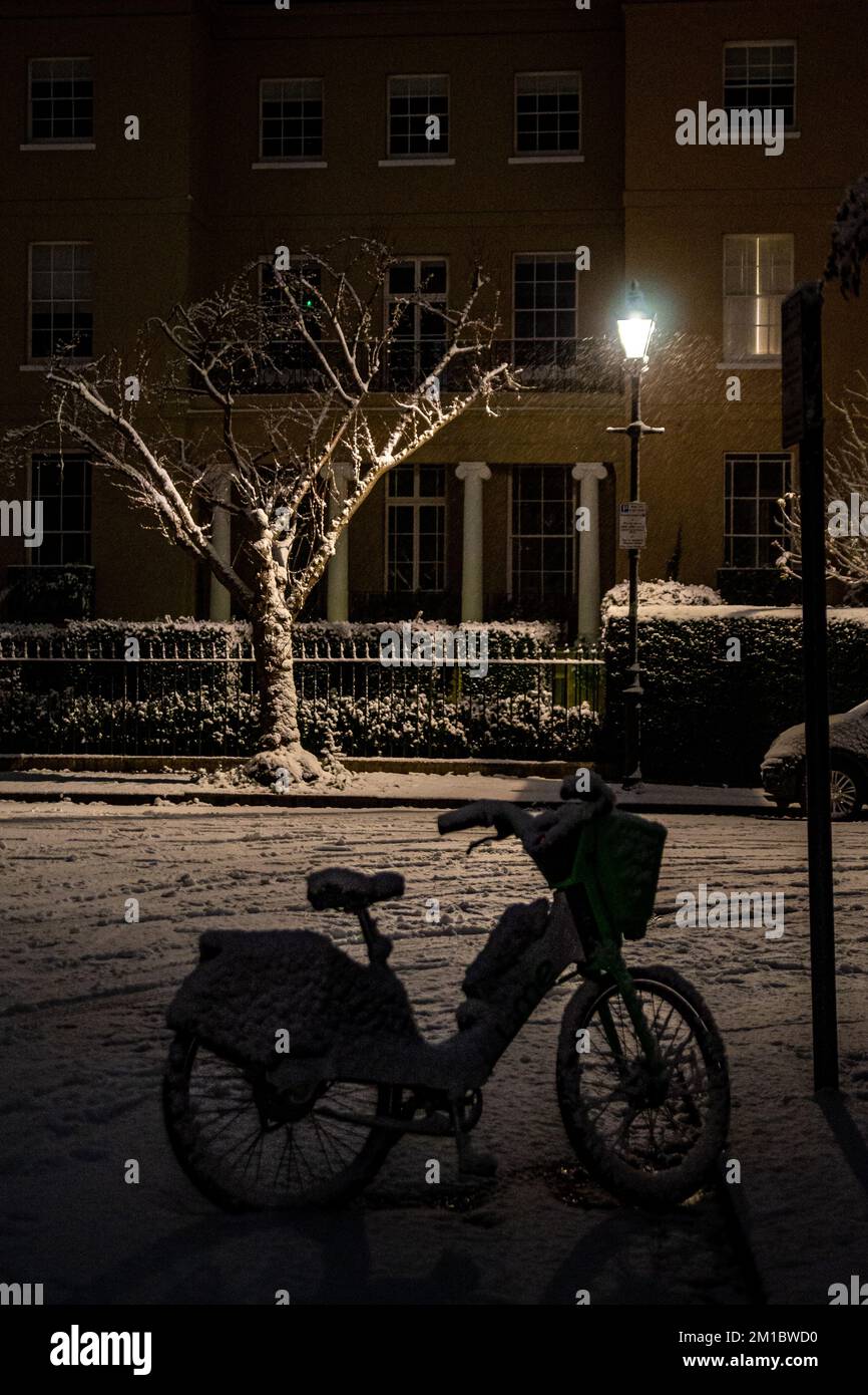 London, UK. 11th Dec, 2022. Snow Envelops Chiswick Mall and the High