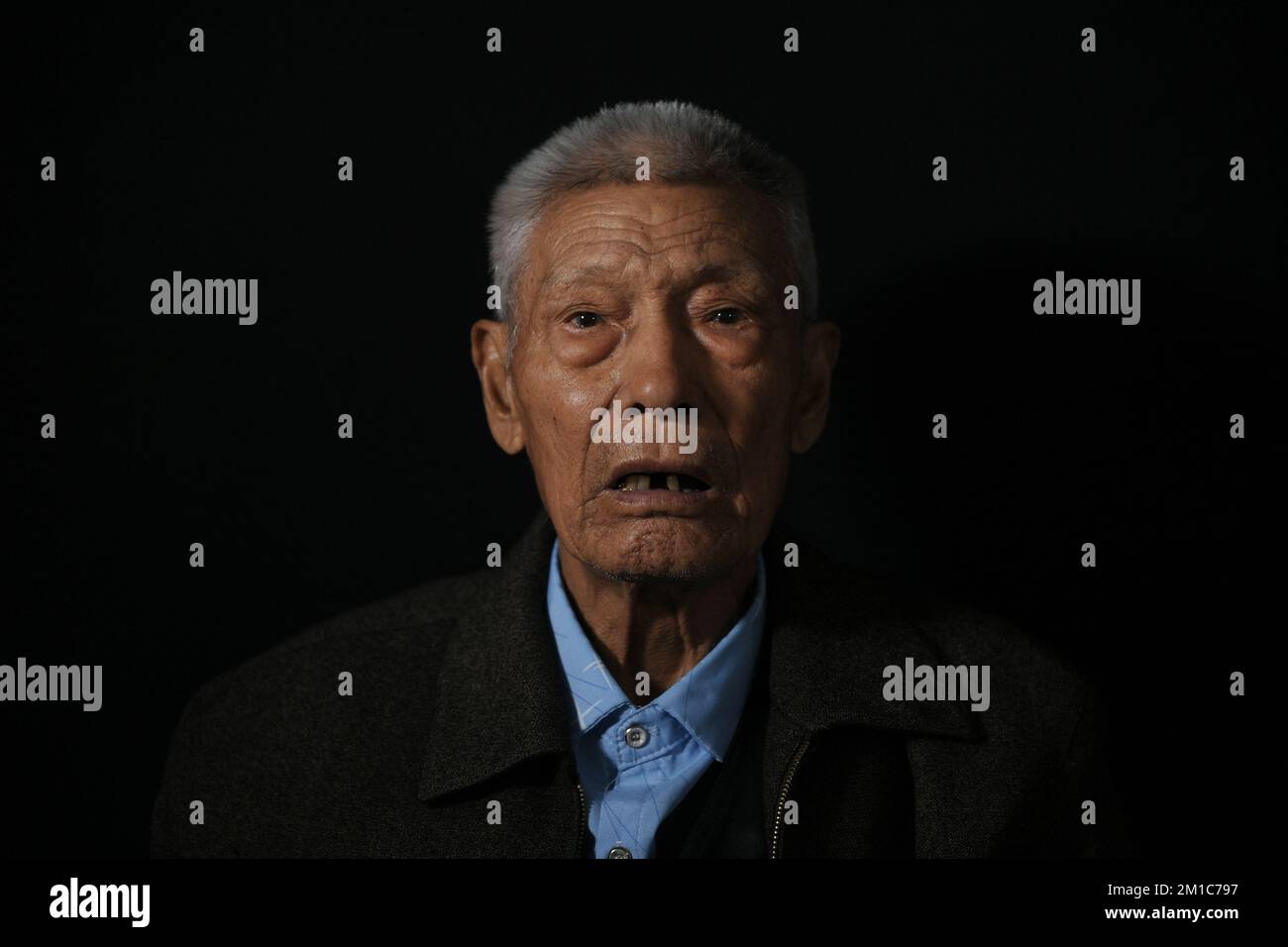 (221212) -- NANJING, Dec. 12, 2022 (Xinhua) -- This photo taken on April 22, 2022 shows the portrait of Guo Linda, a survivor of the Nanjing Massacre, in Nanjing, east China's Jiangsu Province. This year marks the 85th anniversary of the Nanjing Massacre. The Nanjing Massacre took place when Japanese troops captured the then-Chinese capital on Dec. 13, 1937. Over six weeks, they killed approximately 300,000 Chinese civilians and unarmed soldiers in one of the most barbaric episodes of World War II.By Dec. 11, 2022, the number of registered survivors of the massacre has decreased to 54. Reporte Stock Photo