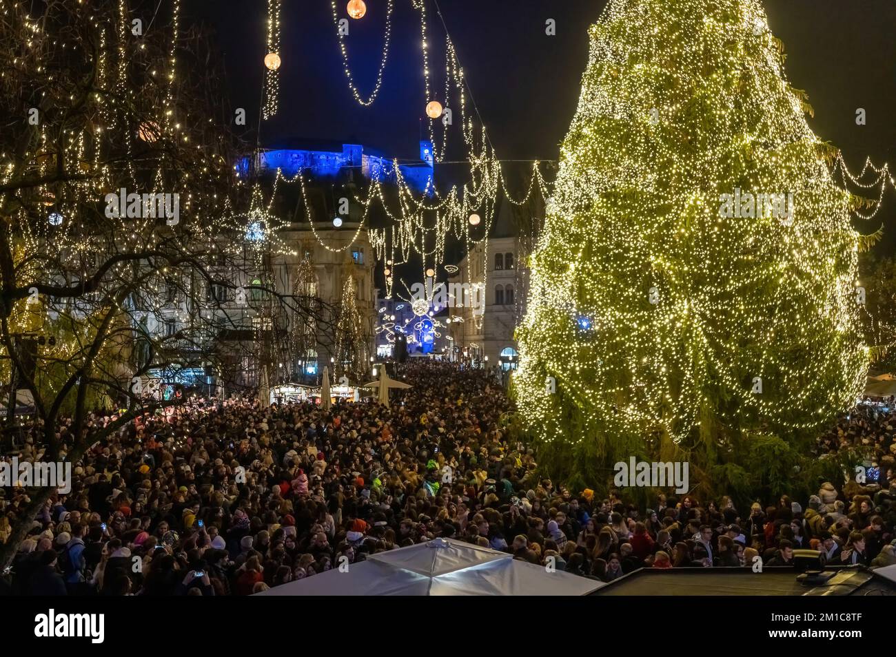 Ljubljana, Slovenia. 25th Nov, 2022. Thousands of people gather in PreÅeren Square Square for the traditional lighting of the Christmas tree. This marks the start of the traditional festive season in Ljubljana until the New Year after 2 years of coronavirus restrictions. (Credit Image: © Andrej Tarfila/SOPA Images via ZUMA Press Wire) Stock Photo