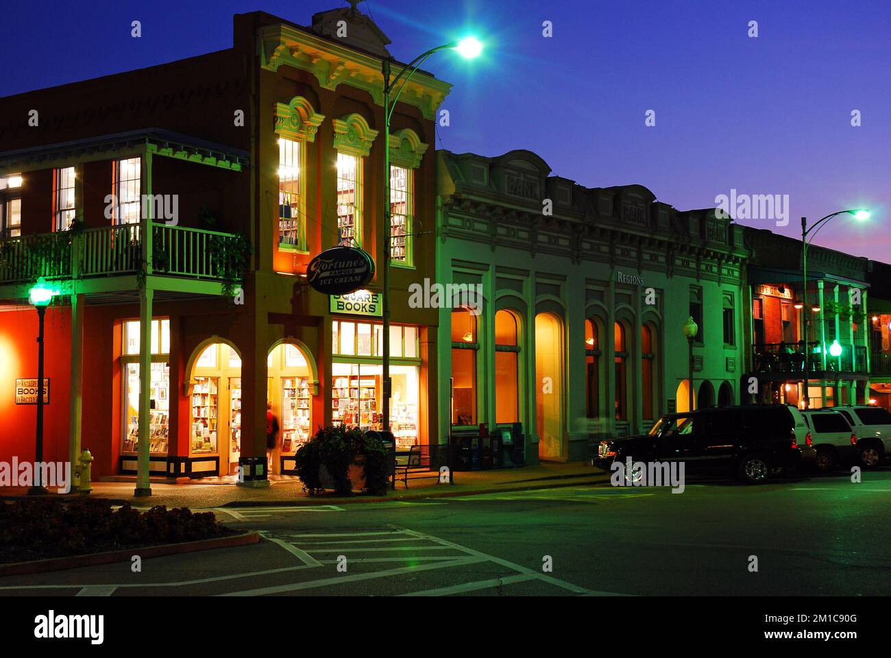Square Books, a famed independent book store, glows against the dusk