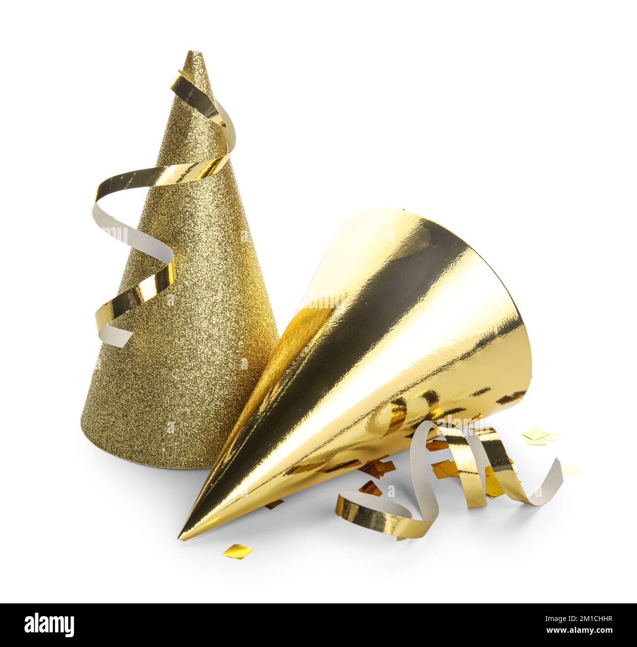 Golden party hats with confetti on white background Stock Photo - Alamy