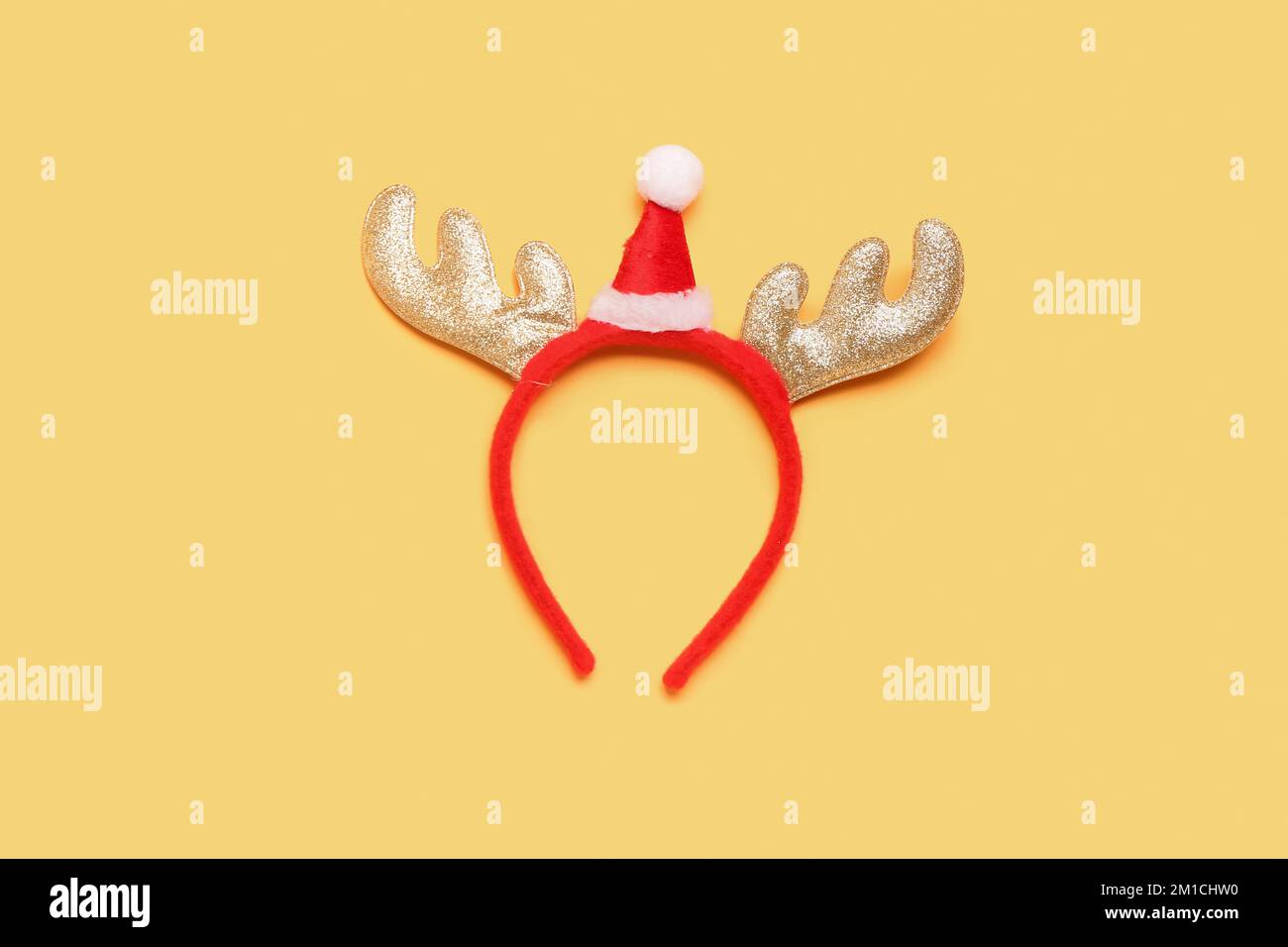 Christmas reindeer horns on yellow background Stock Photo Alamy