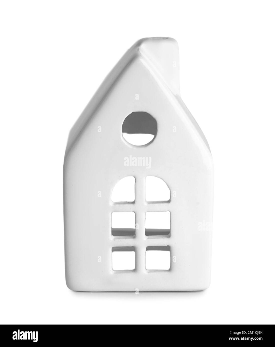 Candle holder in shape of house on white background Stock Photo Alamy
