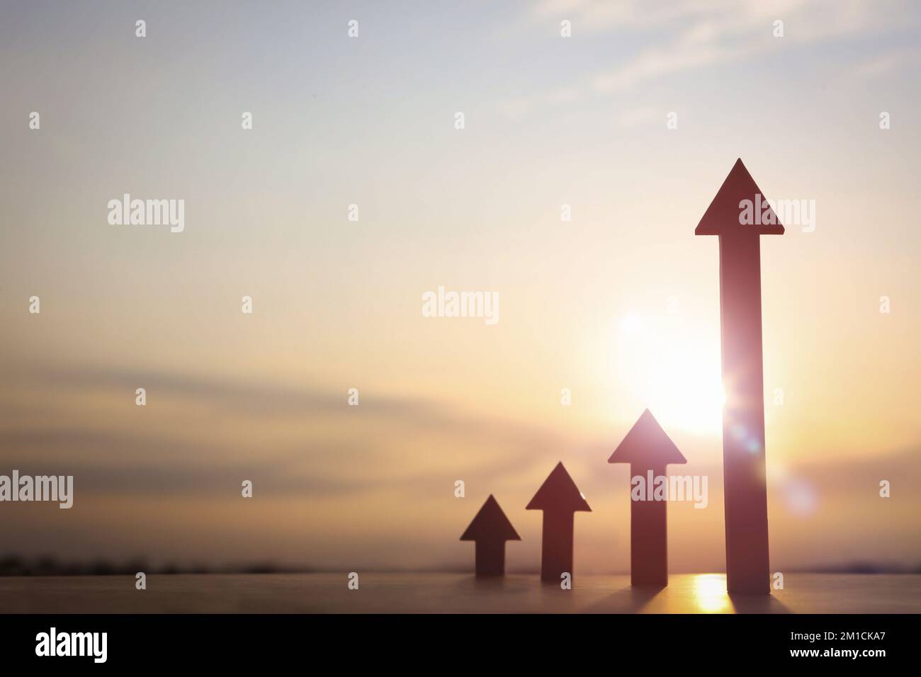 Arrow rising high bright hi-res stock photography and images - Alamy