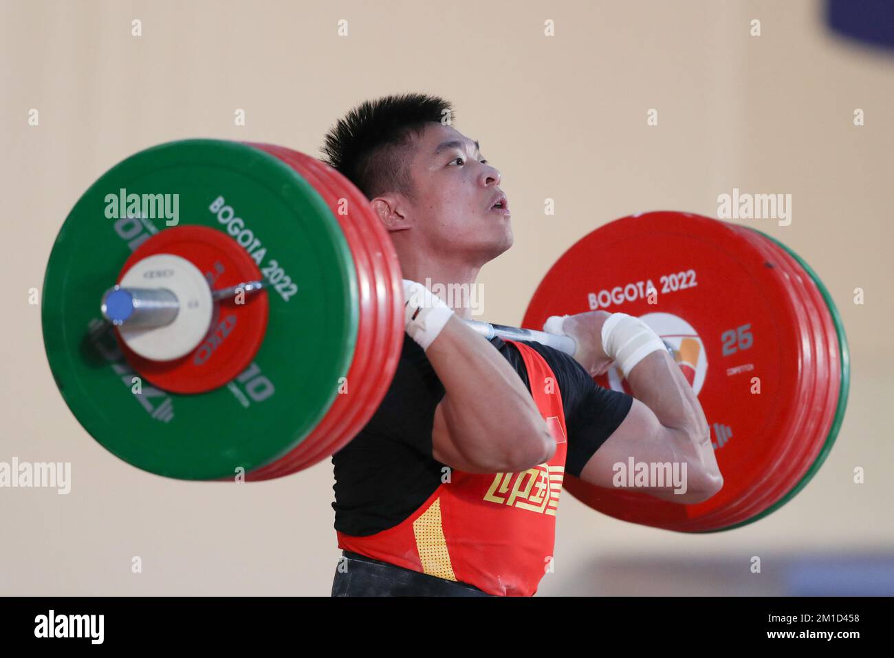Bogota, Colombia. 11th Dec, 2022. Liu Huanhua of China competes during the mens 89kg snatch event at the 2022 World Weightlifting Championships in Bogota, Colombia, Dec