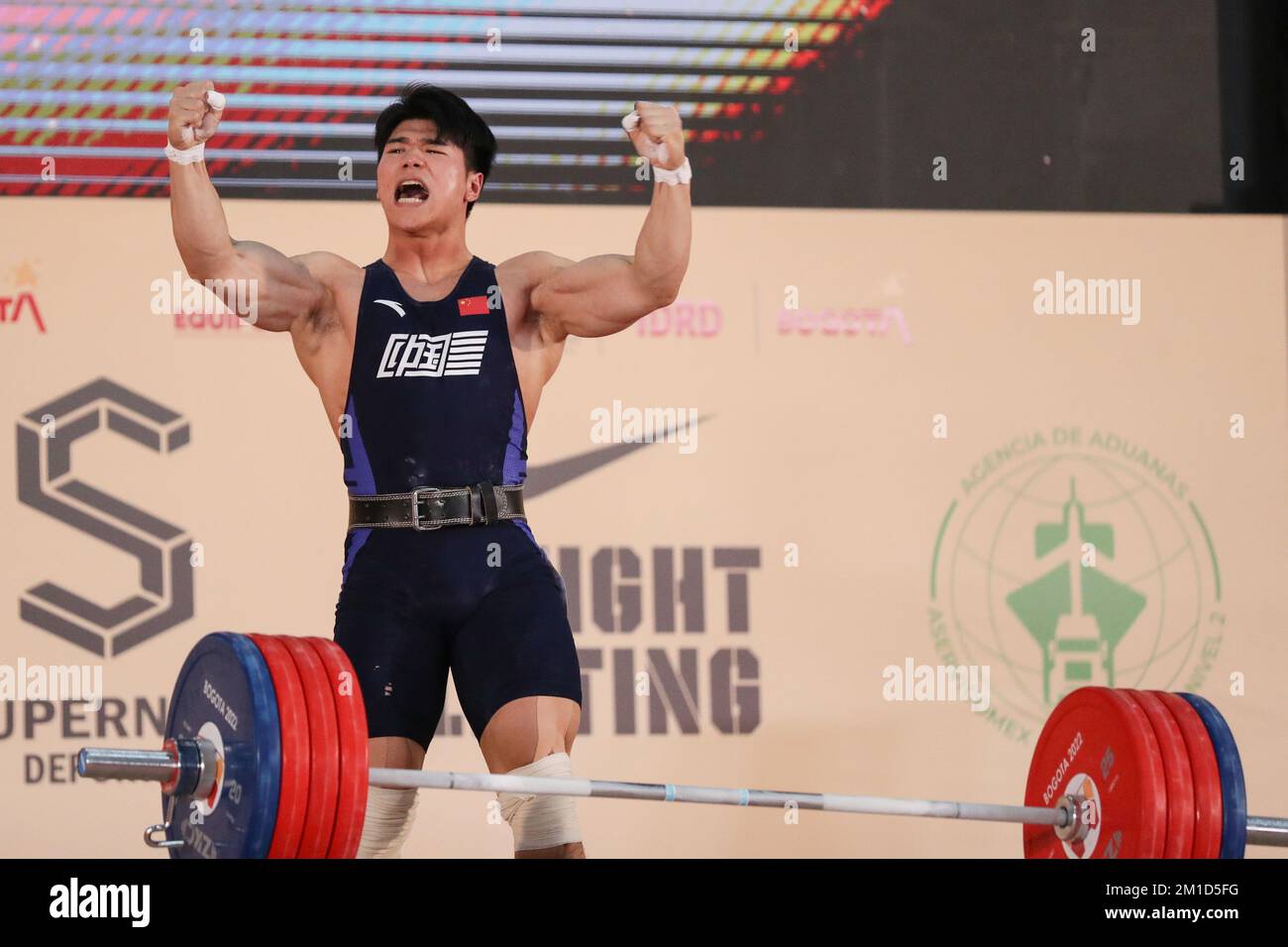 Bogota, Colombia. 11th Dec, 2022. Liu Huanhua of China celebrates during the mens 89kg clean and jerk event at the 2022 World Weightlifting Championships in Bogota, Colombia, Dec