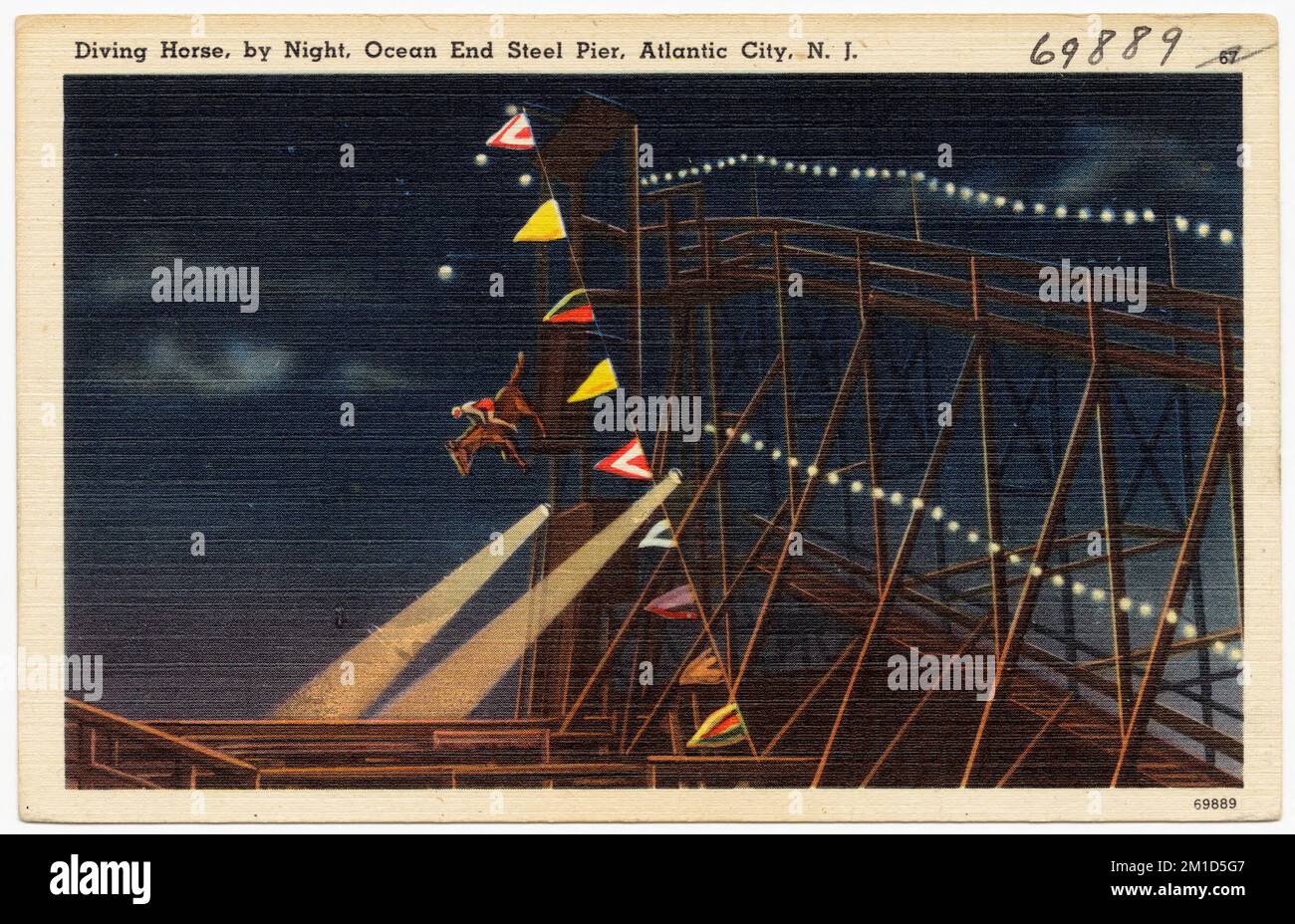 Diving horse, by night, ocean end Steel Pier, Atlantic City, N. J. , Piers & wharves, Tichnor Brothers Collection, postcards of the United States Stock Photo