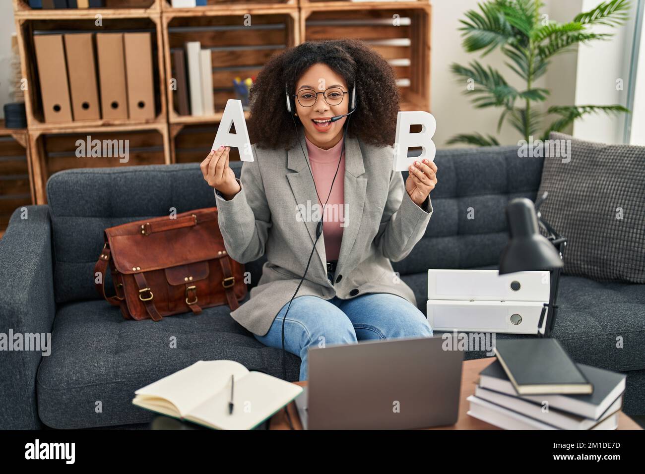 African woman laughing speech hi-res stock photography and images - Alamy