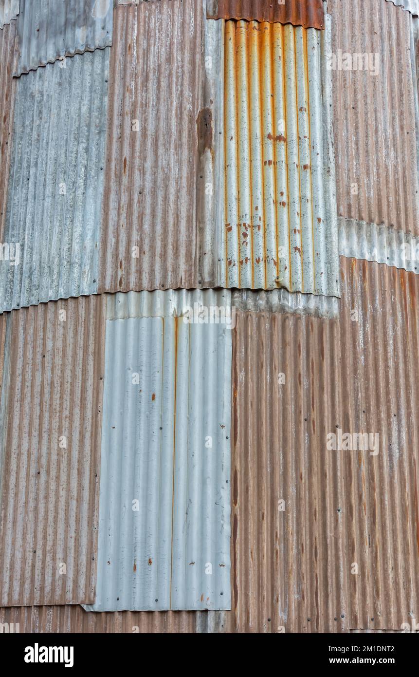Curved facade of rusted corrugated iron at an old granary Stock Photo