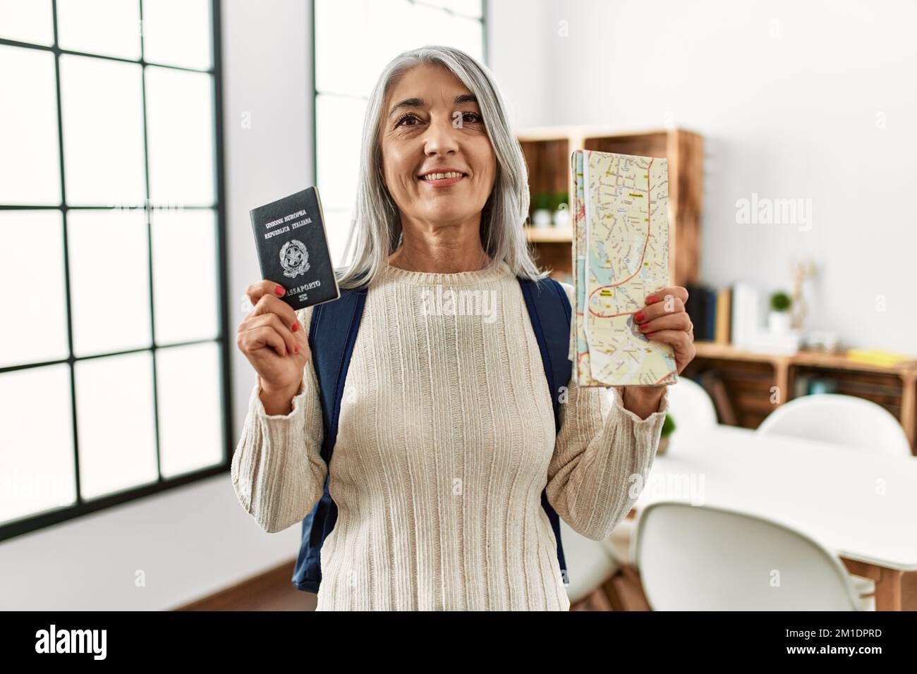 Mature woman passport map hi-res stock photography and images - Alamy