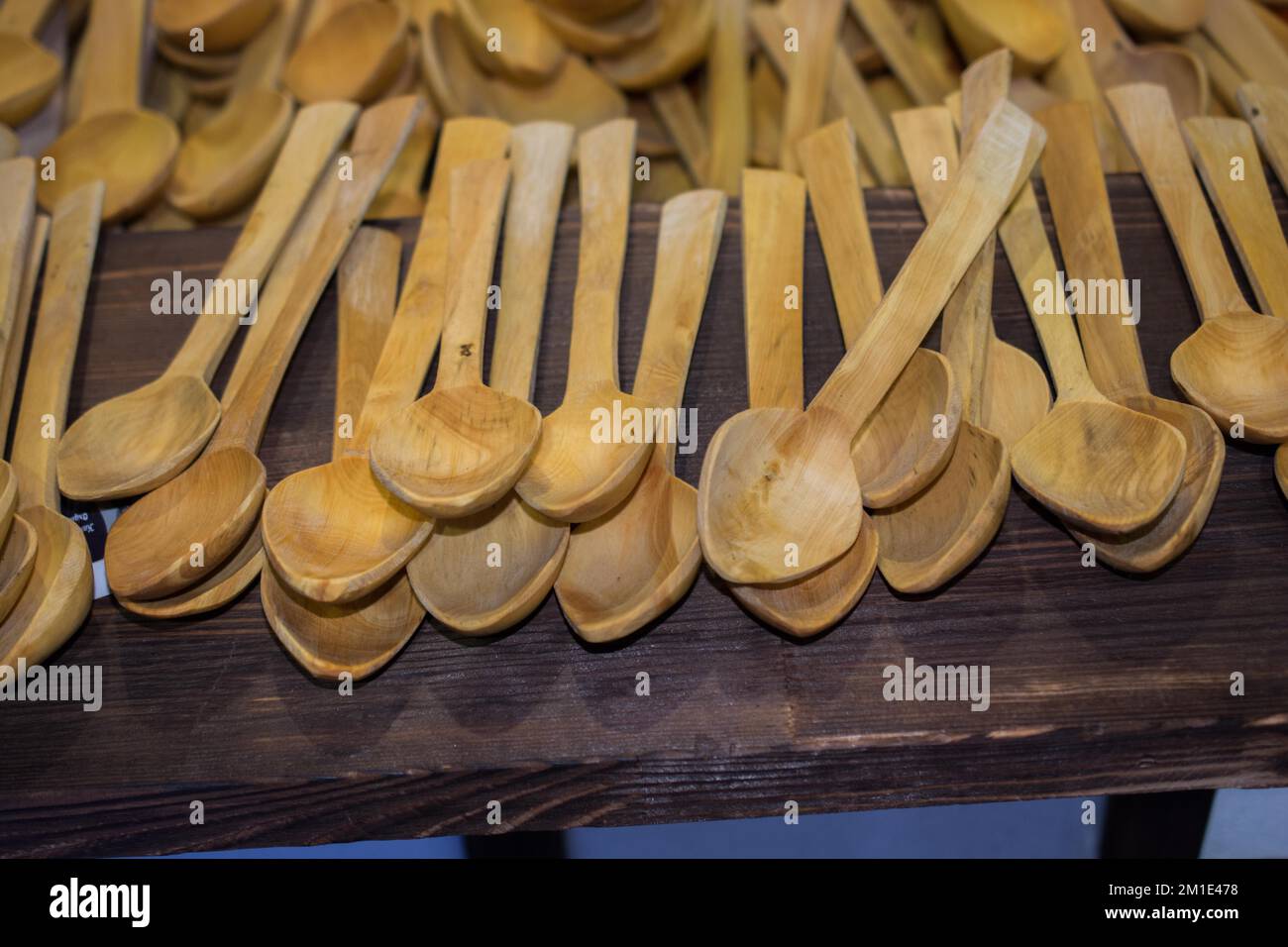Dozens of soup spoon or tablespoon made of wood Stock Photo