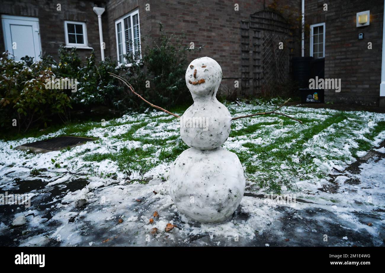 Brighton UK 12th December 2022 - A snowman in Brighton this morning as the freezing weather is forecast to last for the next few days throughout Britain . : Credit Simon Dack / Alamy Live News Stock Photo