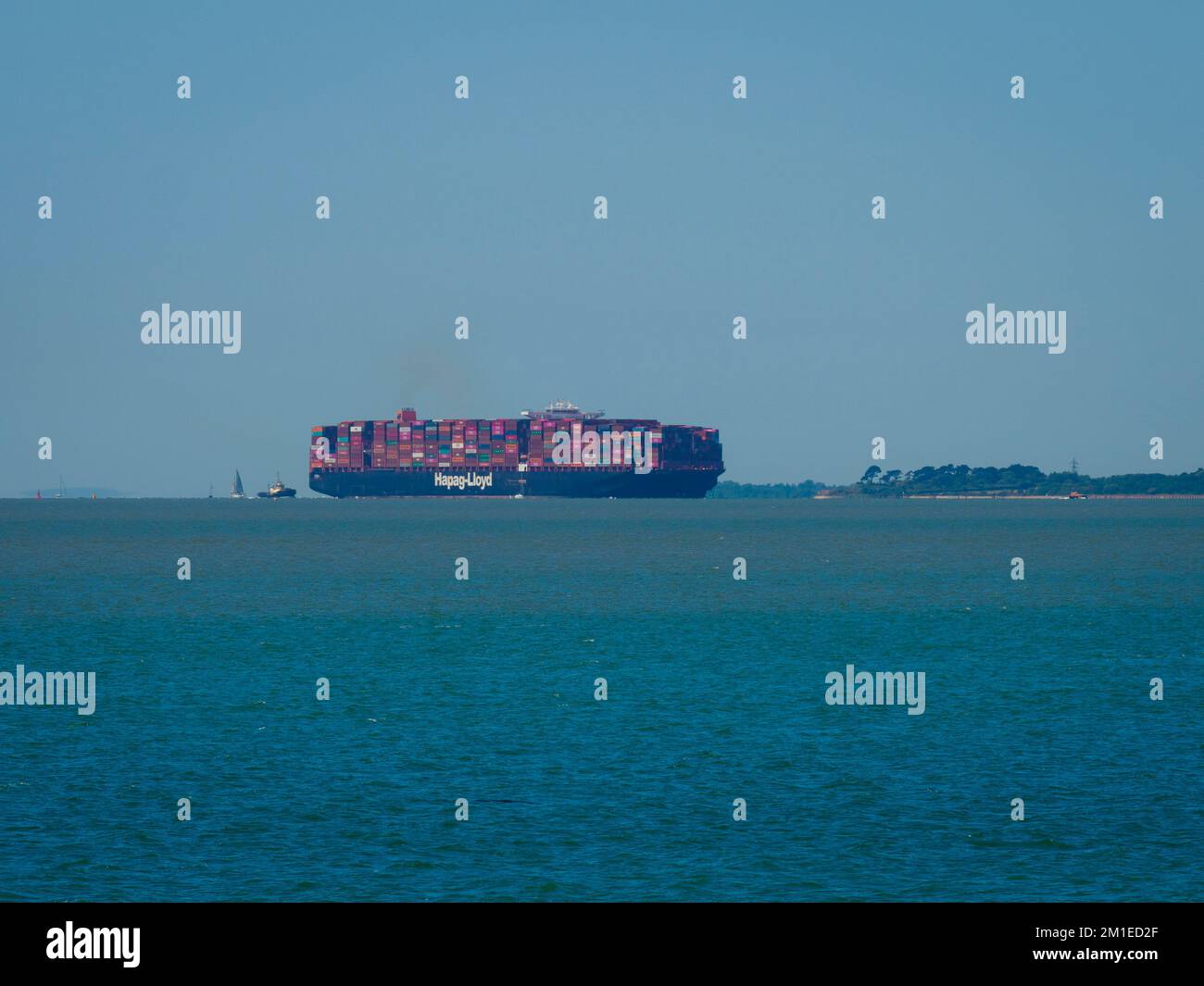Hapag-Lloyd container ship on the shipping lane in The Solent, Hampshire, UK Stock Photo