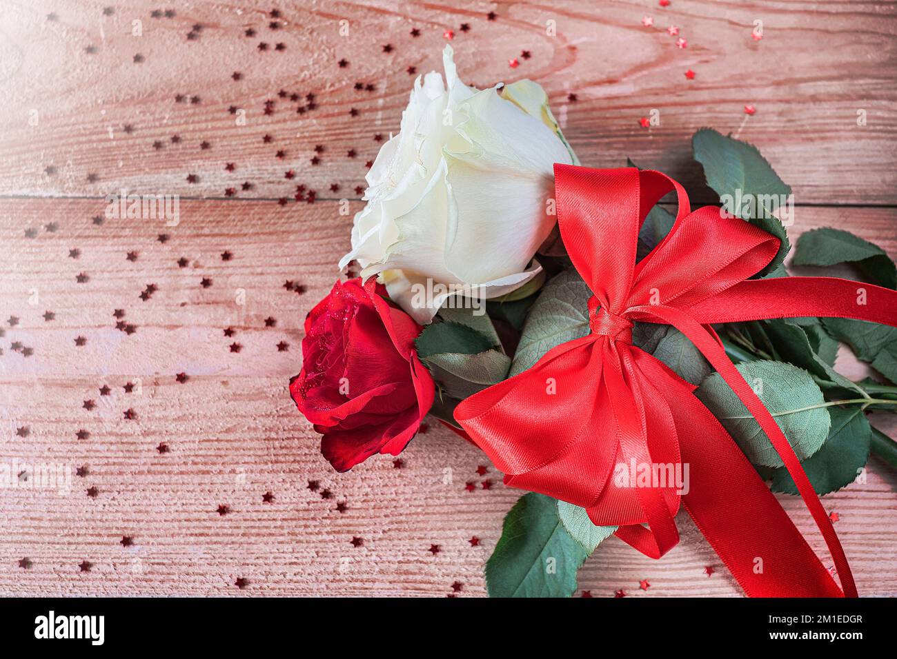 White and red roses on wooden table background with copy space Stock ...