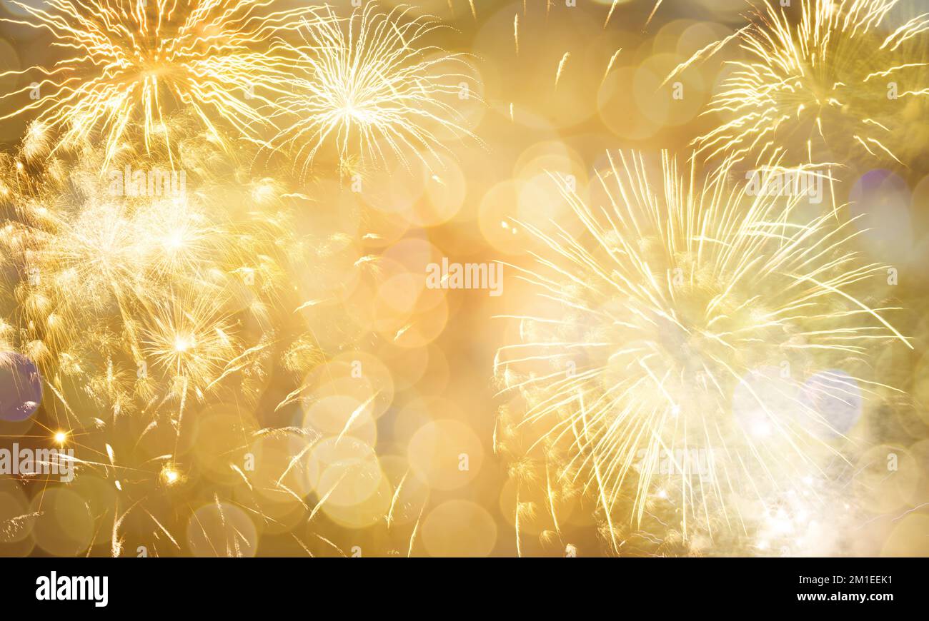 New Year fireworks golden background, happy holidays and new year concept Stock Photo
