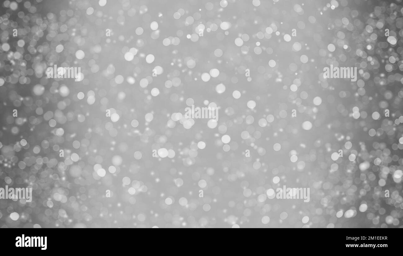 Bright white Christmas background with snow and blur Stock Photo