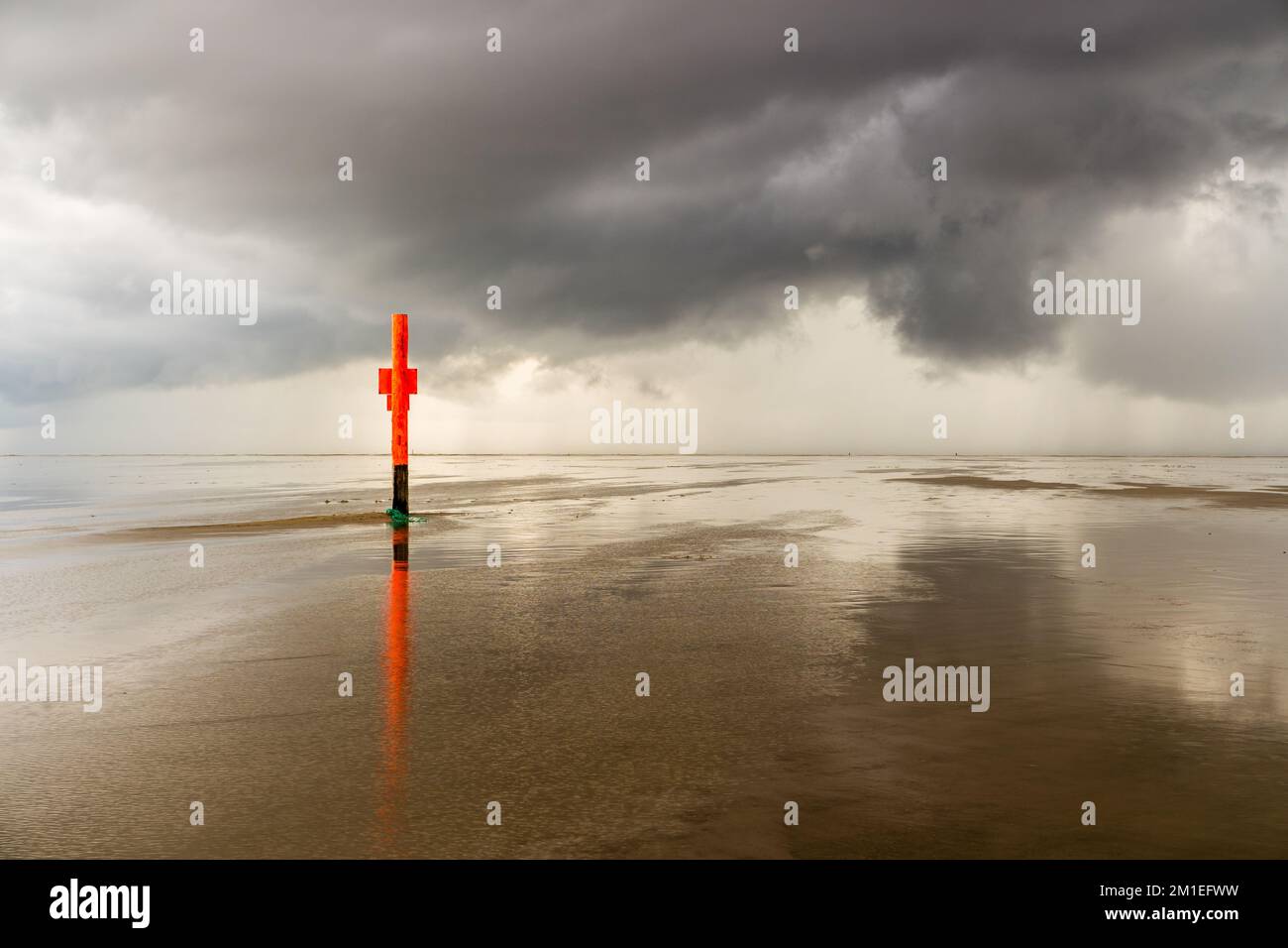 Wadden Sea on the North Sea with a warning sign Stock Photo