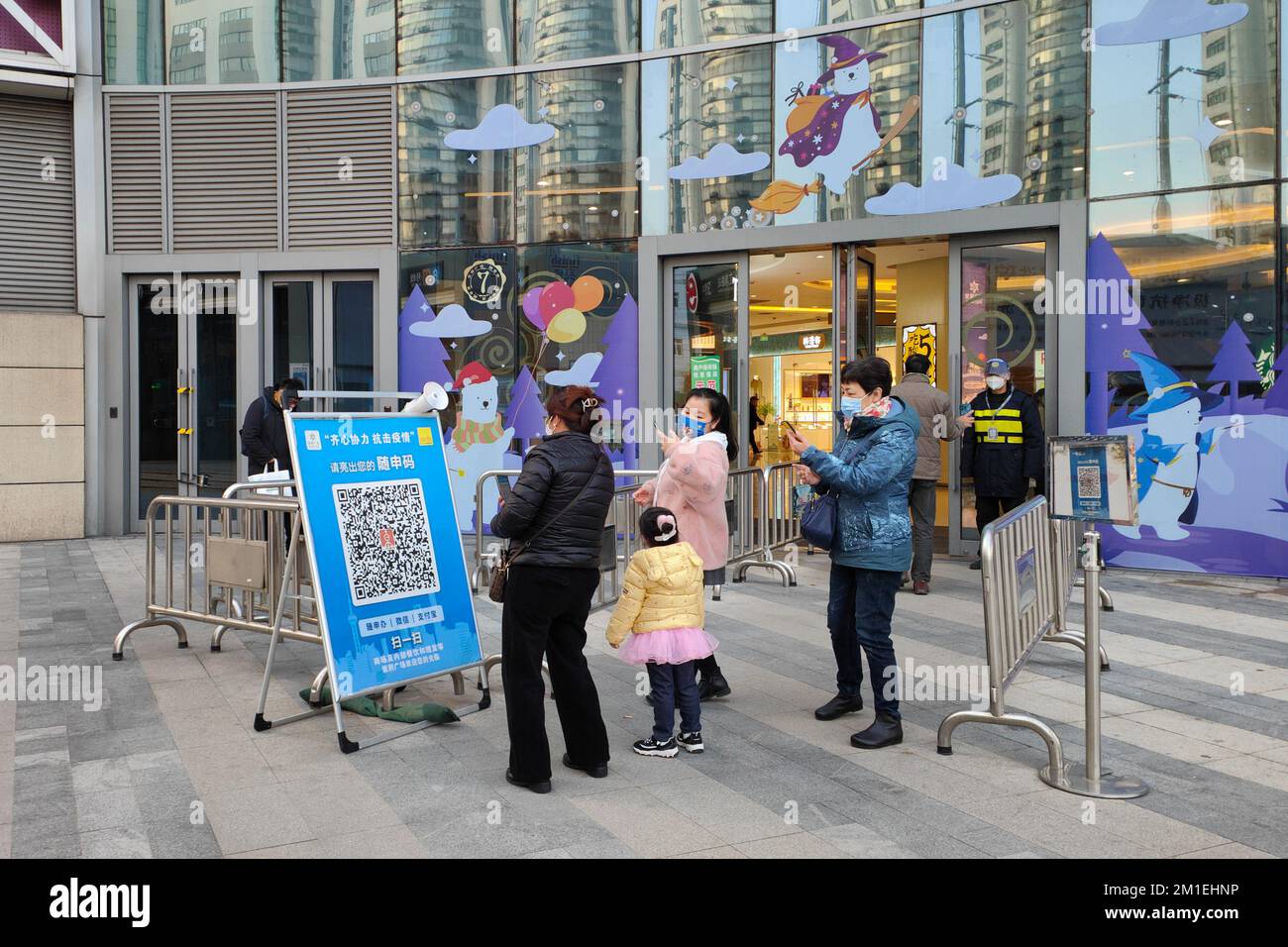 SHANGHAI, CHINA - DECEMBER 12, 2022 - Customers scan the place code ...