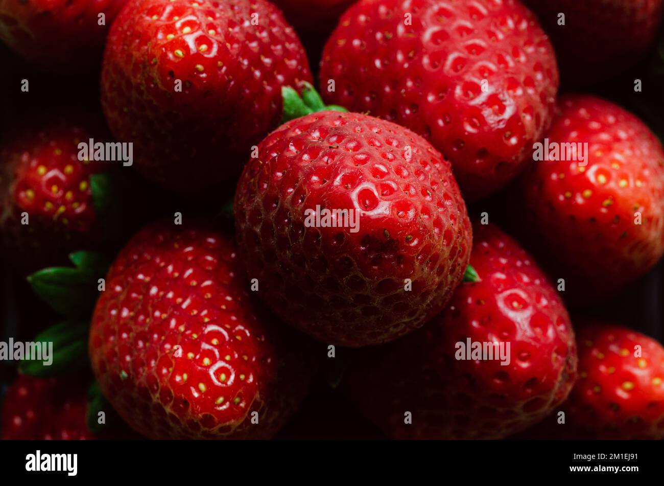 Macro photography of ripe strawberries. Backgrounds and textures ...