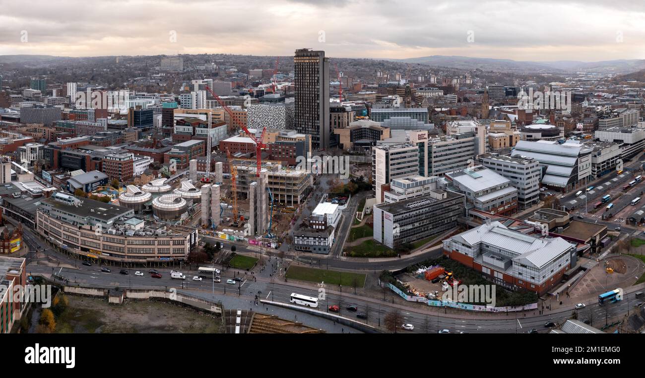 An aerial panorama of Sheffield city centre with a tall skyscraper being built on a city construction site with investment for the North of England Stock Photo