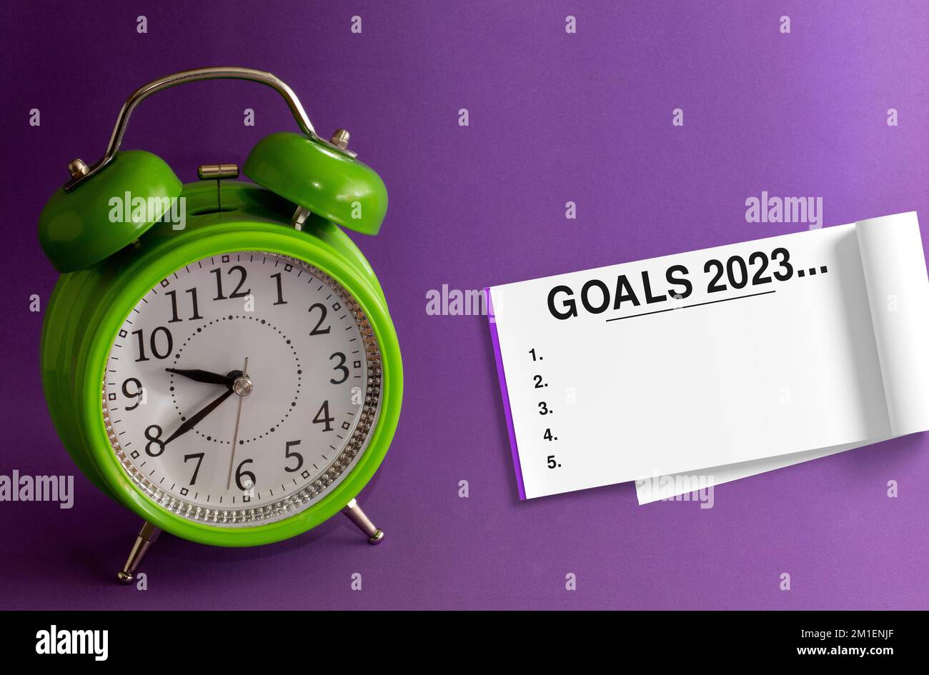 GOALS 2023. Work planning for New 2023 Year in office purple background