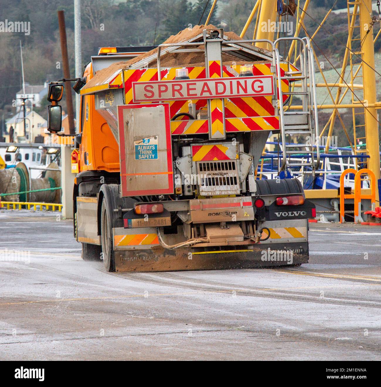 Gritter lorry spreading road salt on ice covered roads in Union Hall ...