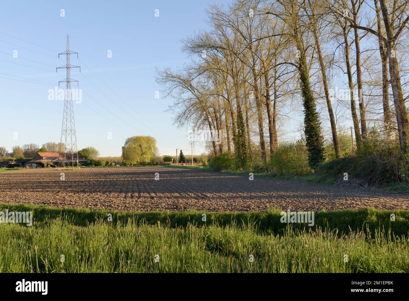 Newly plowed field for planting crops in the countryside Stock Photo